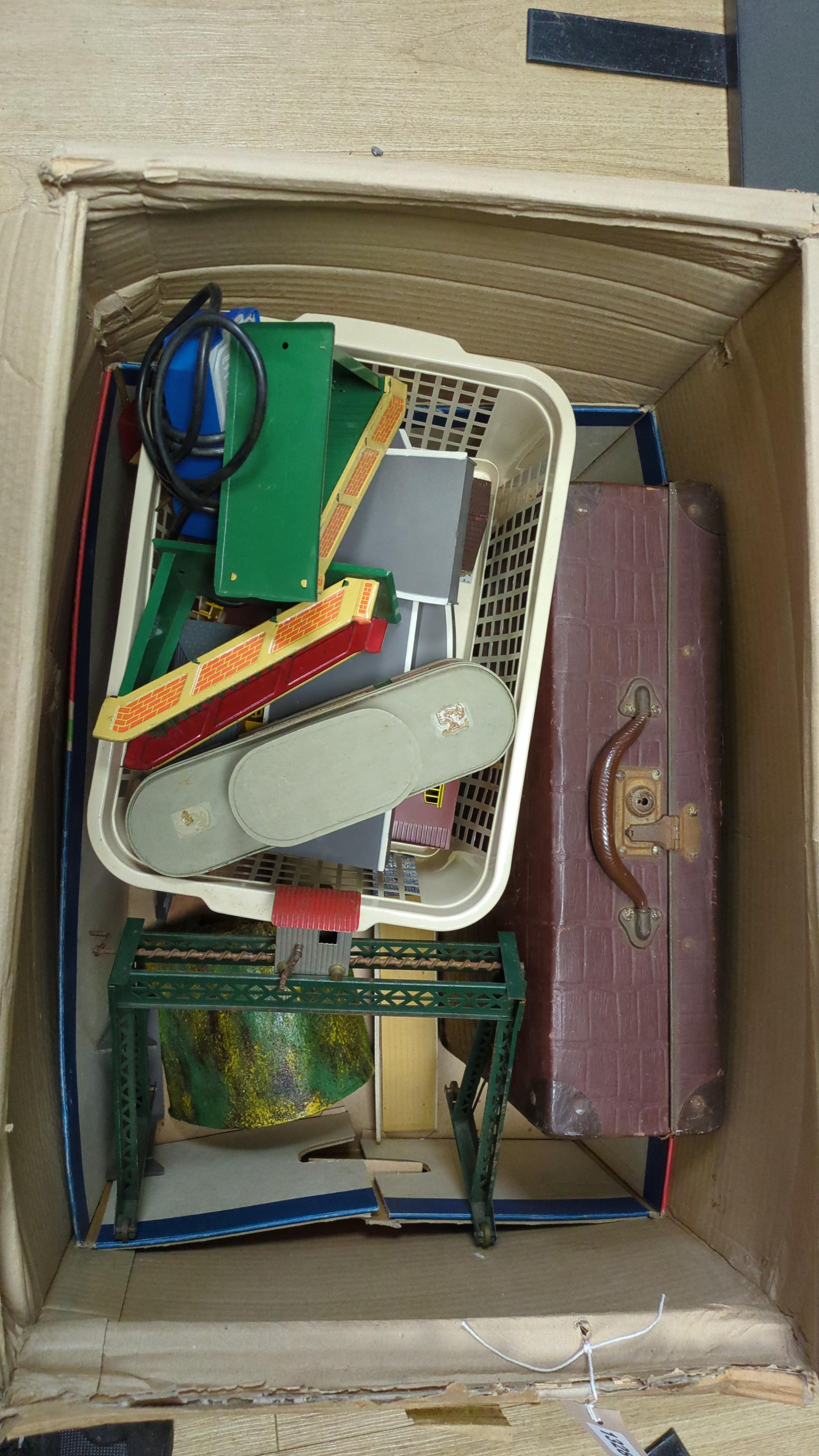 Assorted toy train accessories, tinplate dock crane, etc.